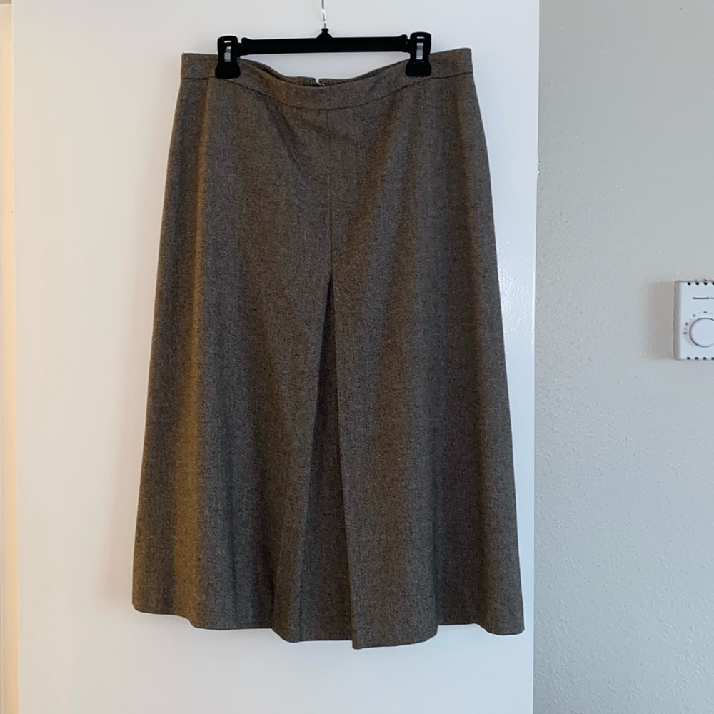 J Crew size 14 midi skirt with one pleat in front.